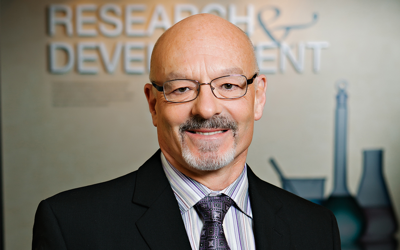 A portrait of Dr. Keith Randolph in Amway's Research and Development department.
