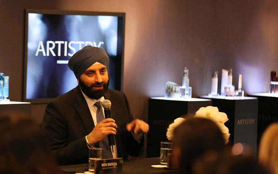 Man speaking into a microphone