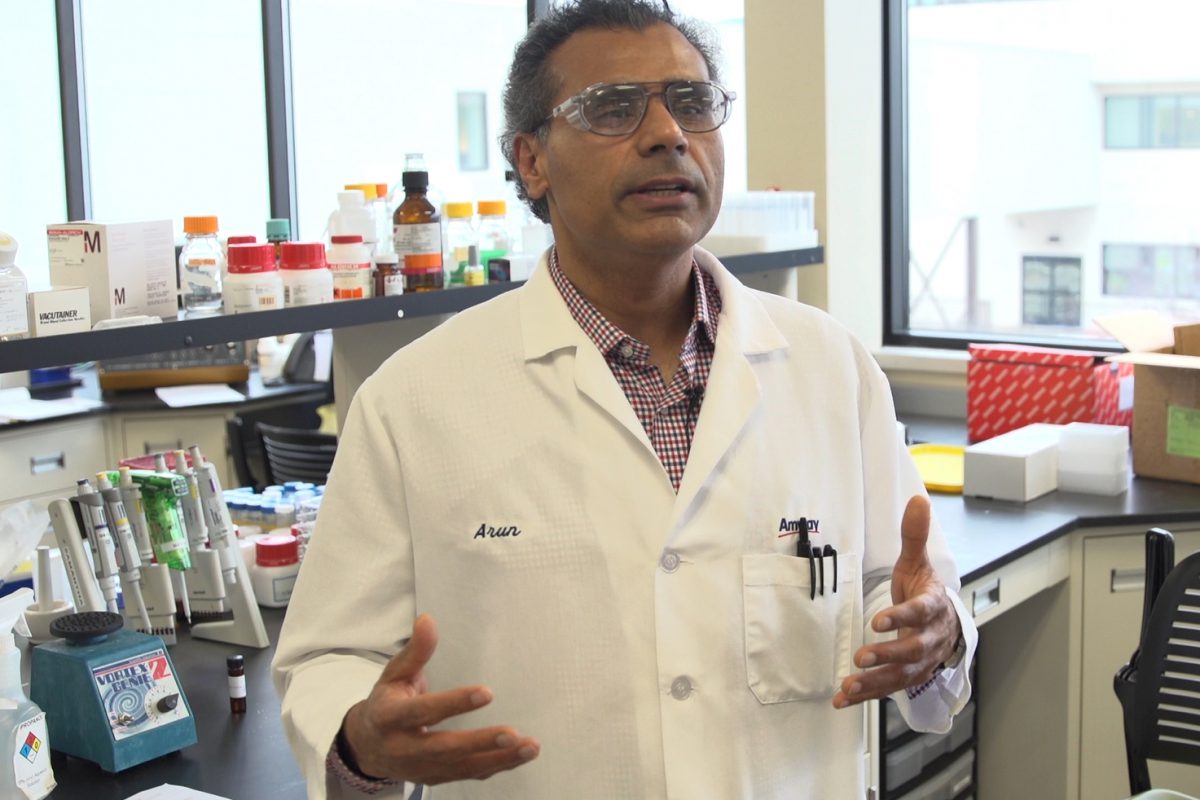 Principal scientist Arun Rajgopal works in the lab at Amway
