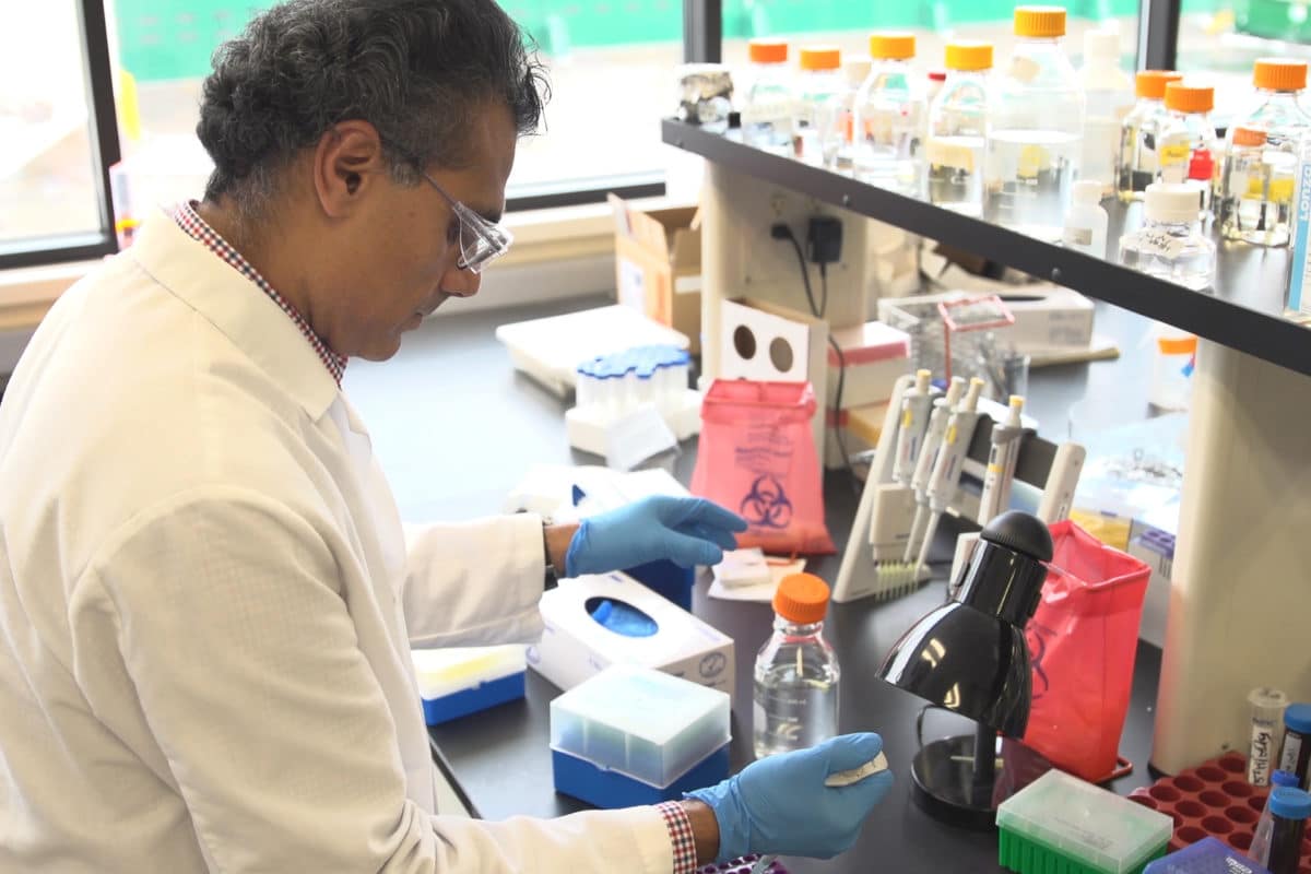 Principal scientist Arun Rajgopal works in the lab at Amway.