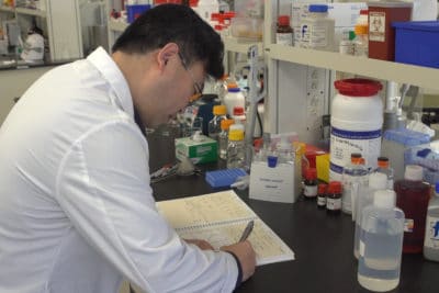 Principal scientist Xun Yan works in the lab at Amway