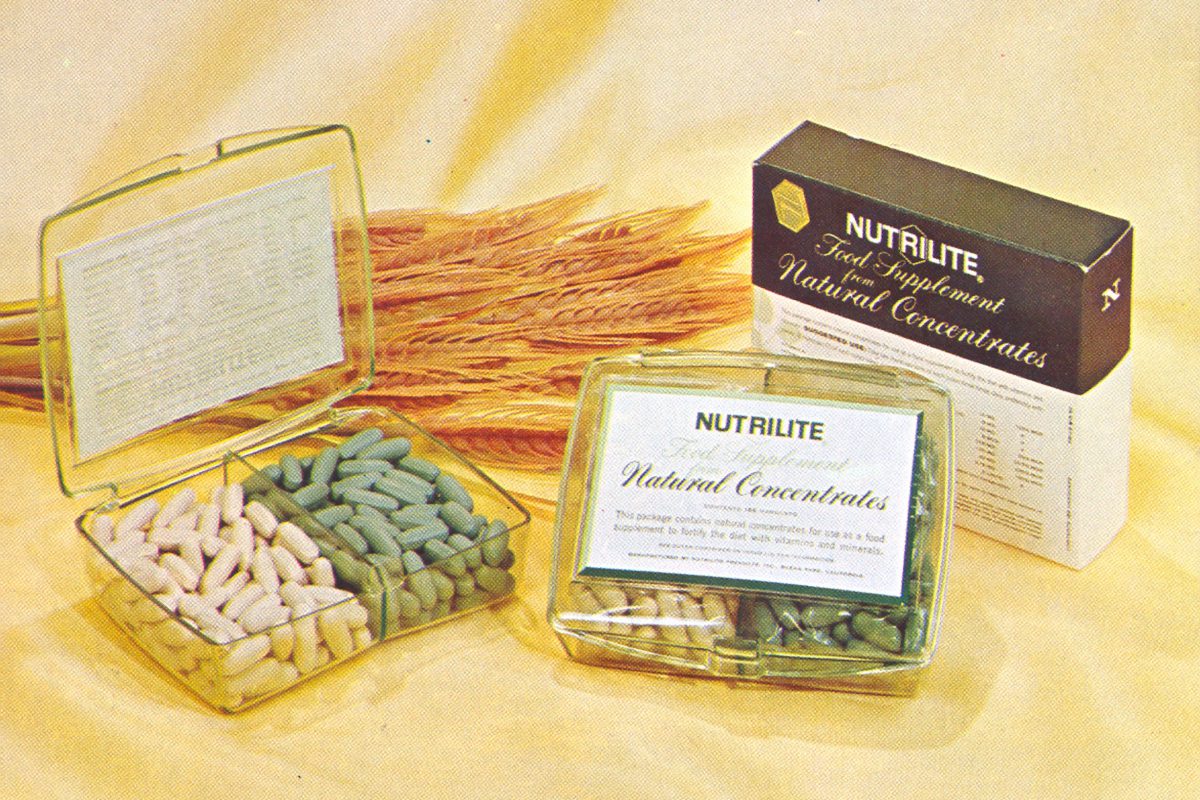 Three packages of Nutrilite supplements