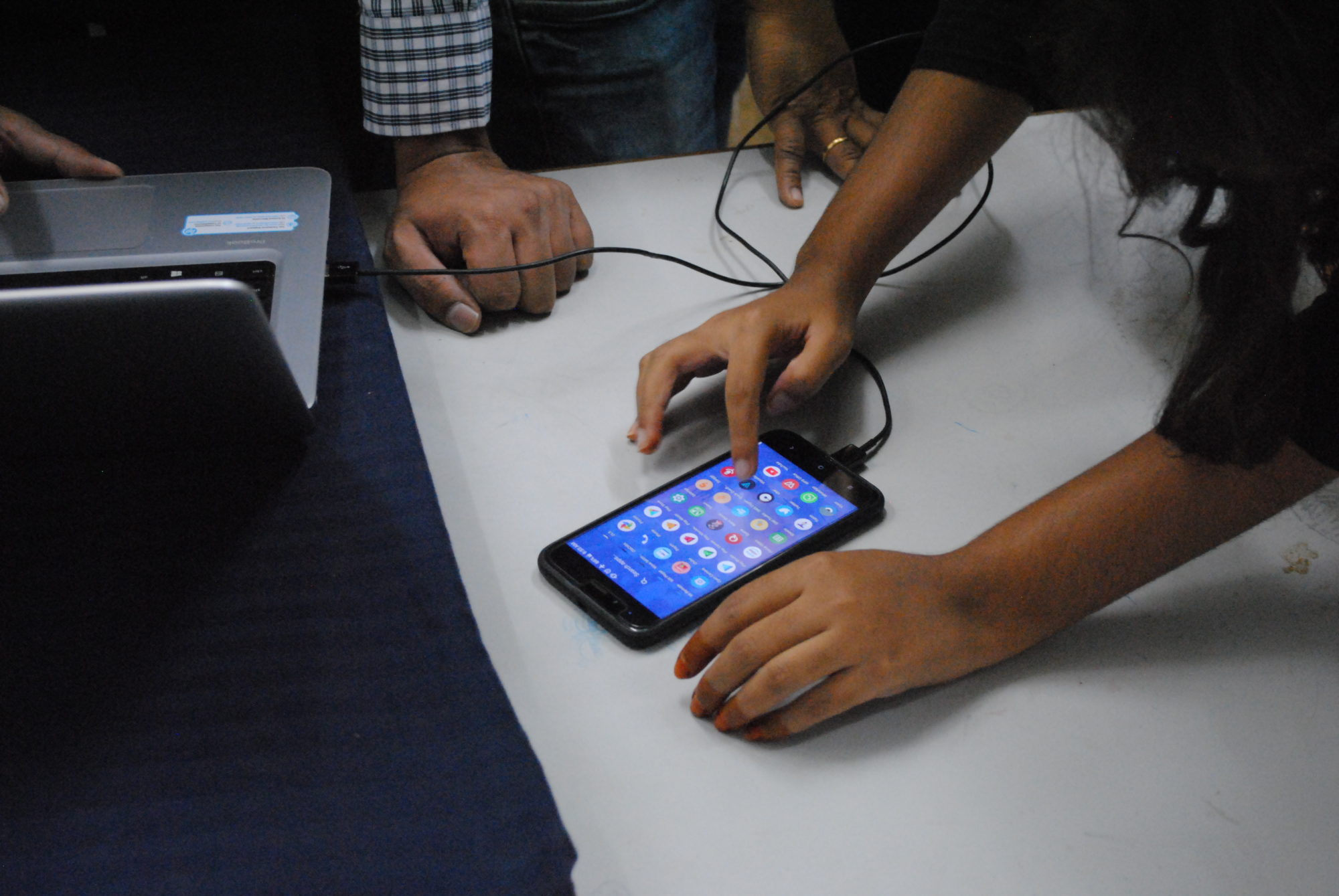 Students working with a smartphone