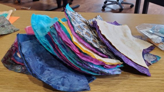 Stack of colorful fabric facemasks