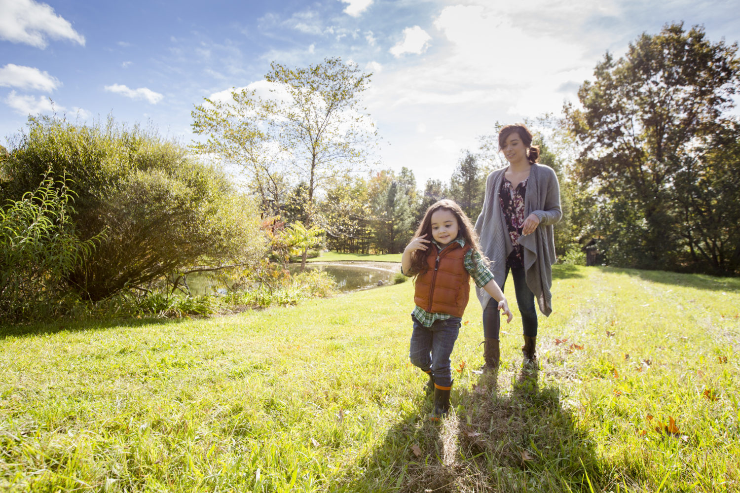 Woman and child walking outside