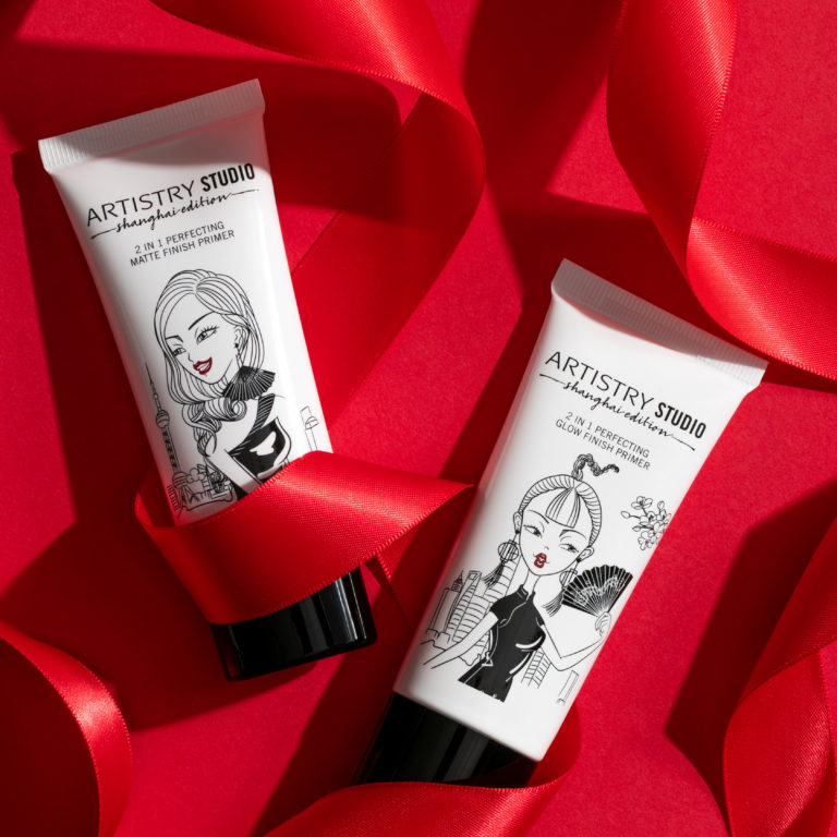 Two bottles of Artistry Studio Shanghai edition 2 in 1 matte finish primers sitting in Red Ribbons