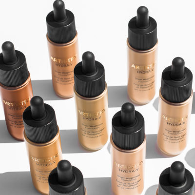 Nine bottles of artistry hydra-v sheer weightless foundation in a range of different colors