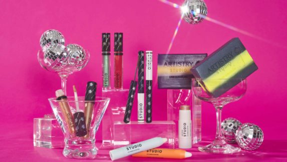 Artistry products on a pink background