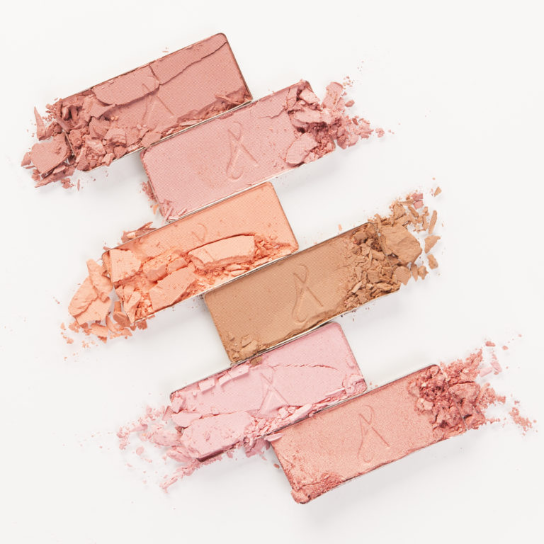 Laydown with six artistry blush colors crushed on white background