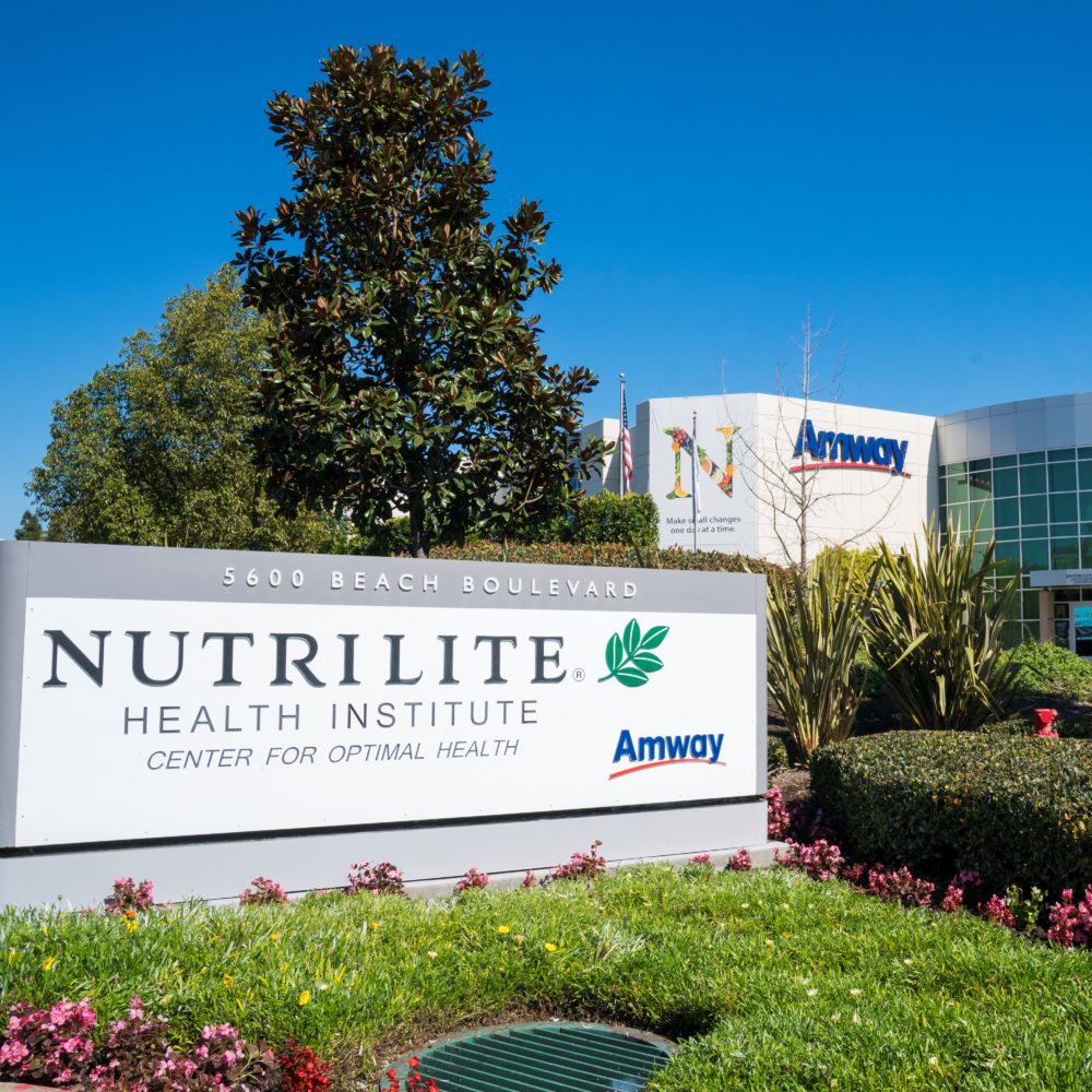 Nutrilite Health Institute Center for Optimal Health sign with the building in the background.