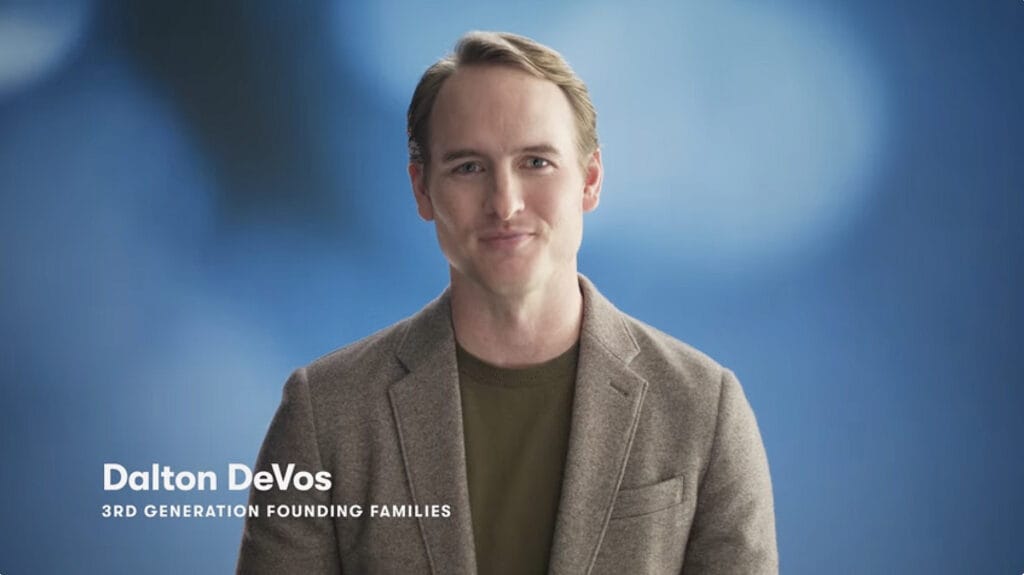 Video thumbnail of Dalton DeVos wearing a beige sports coat in front of a blue background. He is discussing the vital role family plays in Amway.